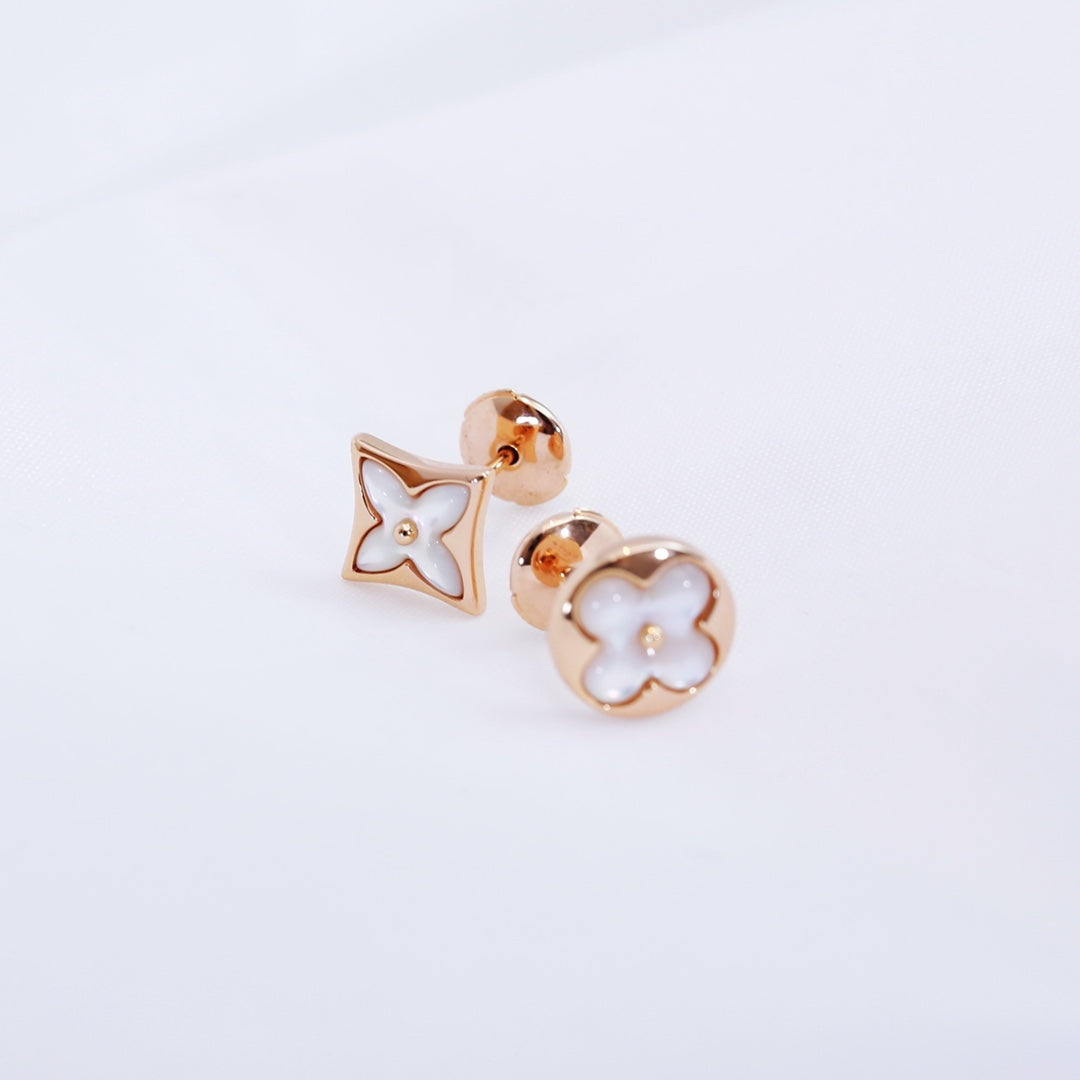 [Everoly JW]Ohrstecker mit Stern und Sonne in Roségold