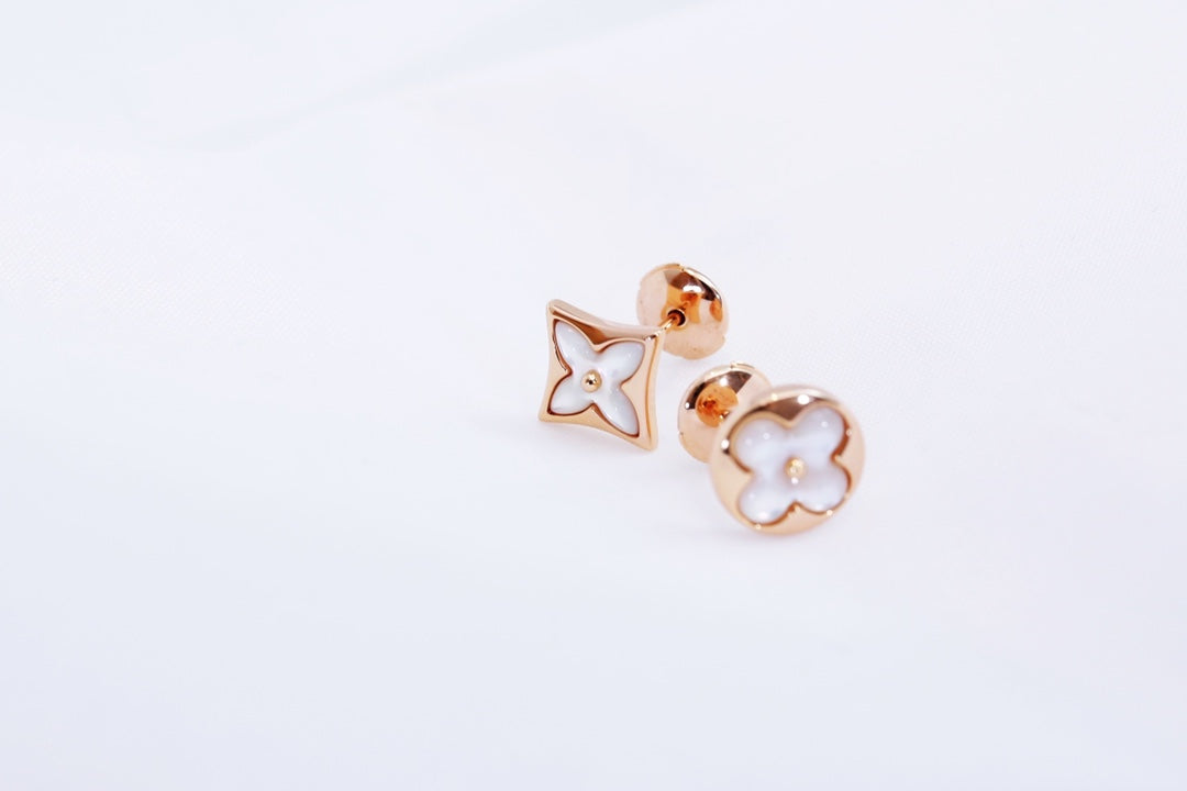 [Everoly JW]Ohrstecker mit Stern und Sonne in Roségold