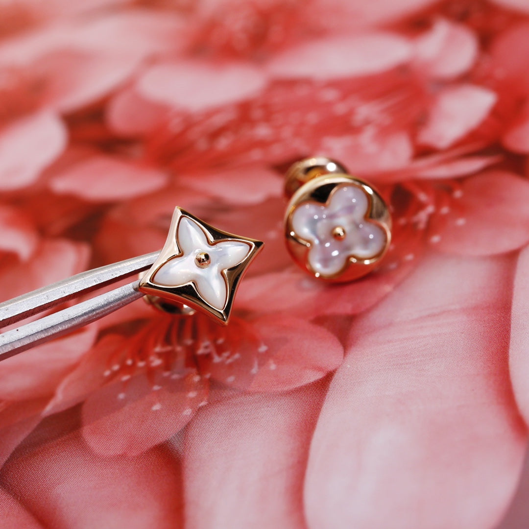 [Everoly JW]Ohrstecker mit Stern und Sonne in Roségold