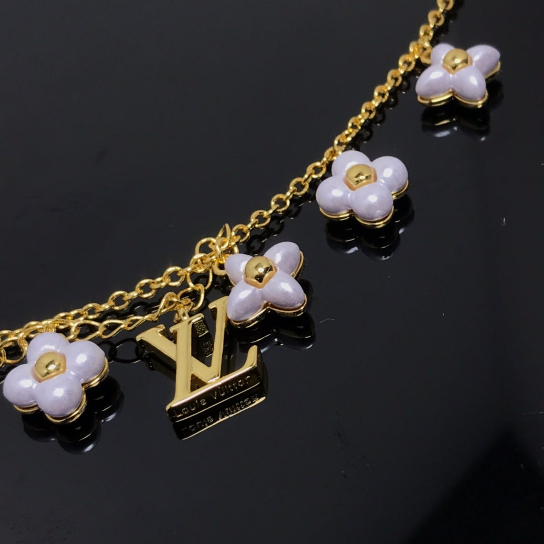 [Elitejewels]Goldarmband mit LV-Logo und 6 Motiven, Sternen und Sonne